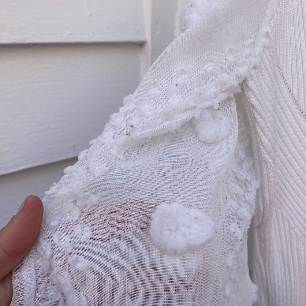 Elegant White Knit Women's Top with Sheer Sleeves and Pom-Poms - Picture 3 of 6